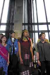 Photo of young people singing. 