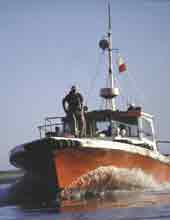 Photo of small fishing boat. 
