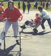 Photo shows young people with disabilities enjoying outdoor activities. 